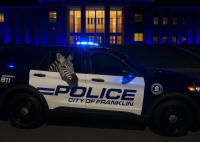 Ed the Zebra in Franklin Police Car
